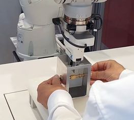 A cobot assists with assembly work