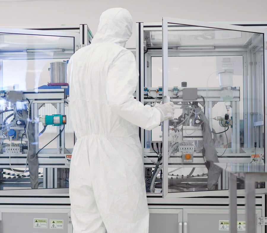 Image shows an employee in the clean room